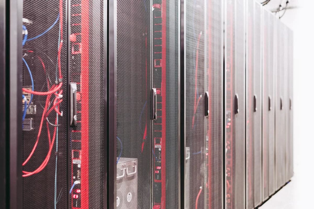Server racks with cables inside a data center