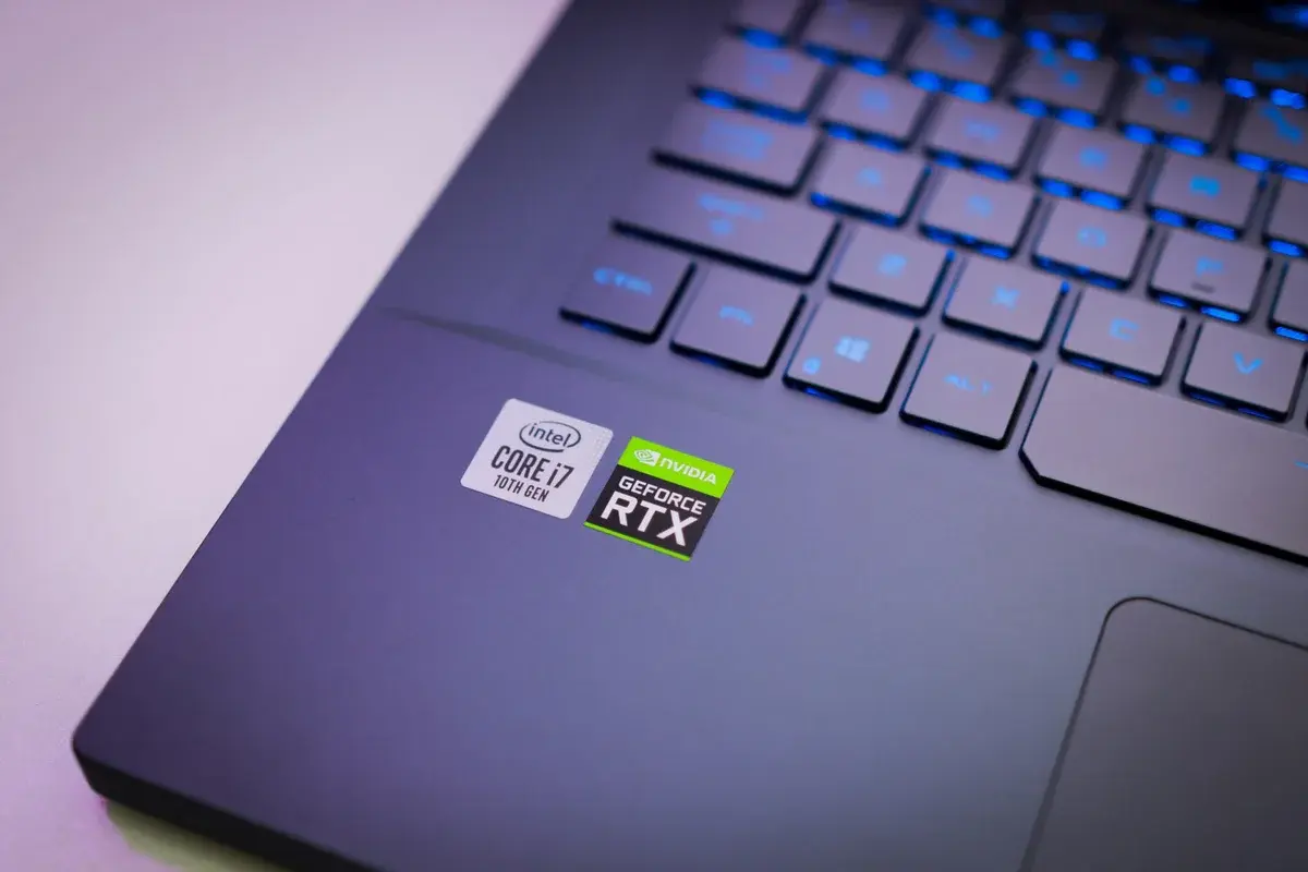 Close-up of a laptop with Intel Core i7 and NVIDIA GeForce RTX stickers.