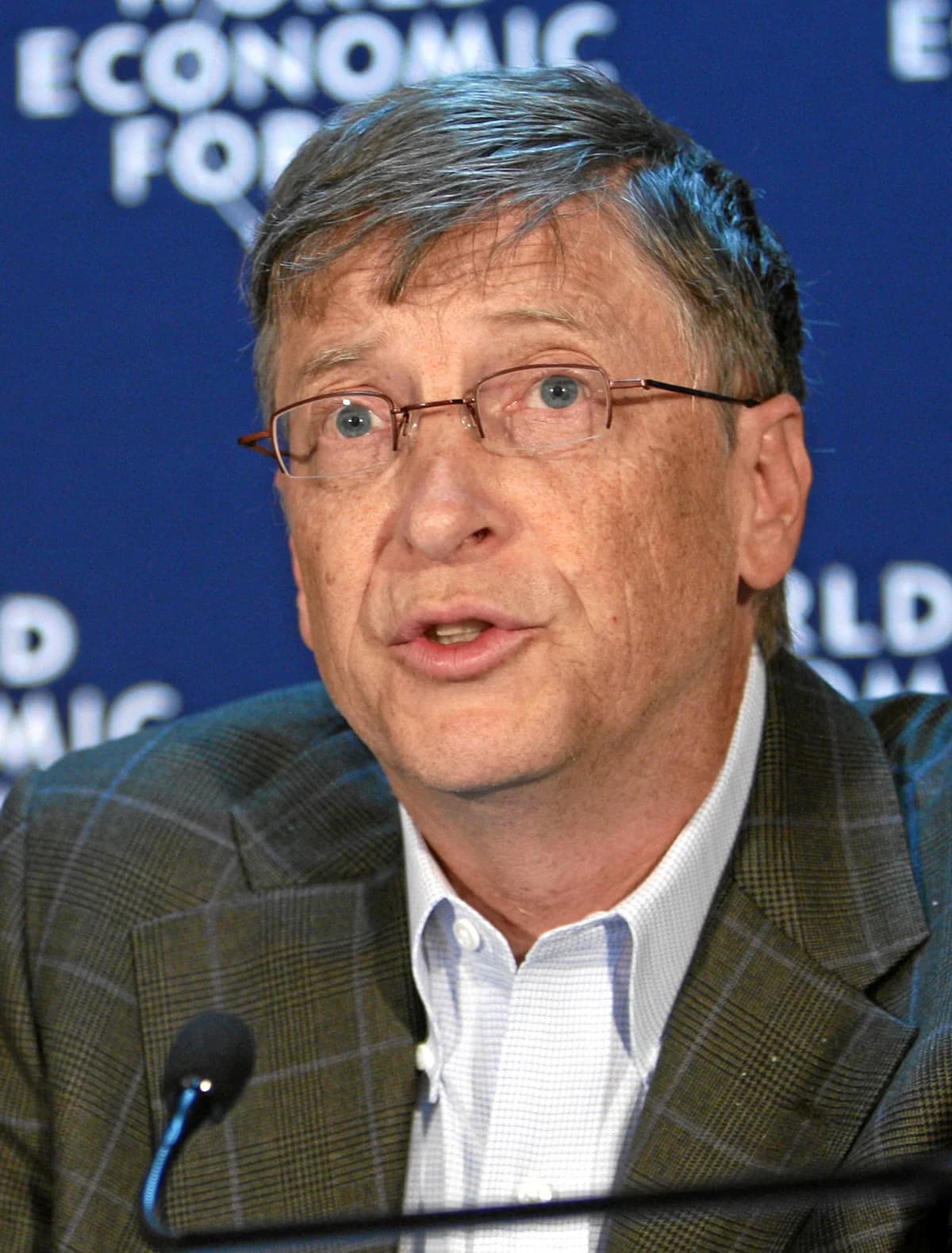 Bill Gates speaking at a World Economic Forum event.