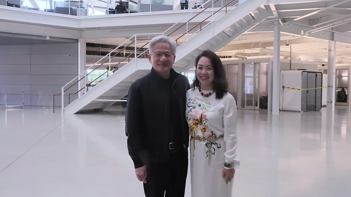 Lê Nguyễn Thiên Nga posing with Jensen Huang inside NVIDIA headquarters.